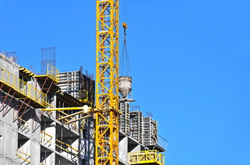 Crane and highrise construction site