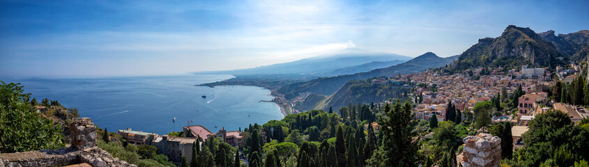 View of the Mediterranean sea, the mountains and Mount Etna near Taormina in Sicily, Italy
