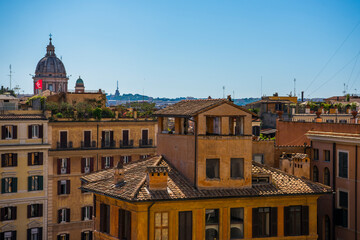 Fototapeta na wymiar Panorama of the old city in the sunlight with a clear blue sky, Rome.