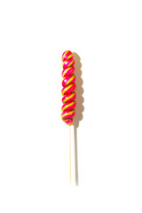 Pink lollipop on white isolated background. Top view, close-up. Poster, postcard.