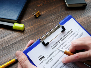 Business concept about Form 8992 U.S. Shareholder Calculation of Global Intangible Low-Taxed Income...