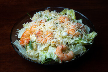 Caesar salad with prawns and Parmesan cheese