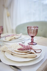 Pink glass on table