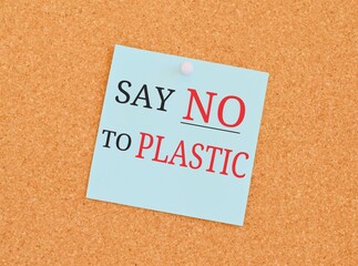 Say no Plastic reminder note over a kork board.Concept meaning ways can eliminate waste Business photo text environmentally responsible consumer behavior.The concept of plastic pollution