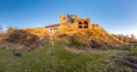 Ruin of castle Zubstejn standing on hill, Czech Republic. Castle built in 13 th century. Autumn day...