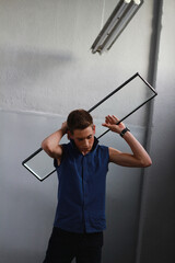 Fototapeta premium Portrait of a handsome stylish sporty man. Photo for business. Beautiful posing.