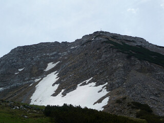 Summit cross of Krottenkopf mountain in Bavarian Alps, Germany