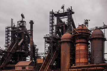 Fototapeta na wymiar Blast furnace equipment of the metallurgical plant, close up view