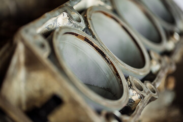 Сar engine after remove the cover part in a workshop.