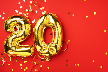 Gold foil balloon number, digit twenty. Birthday greeting card with inscription 20. Anniversary...
