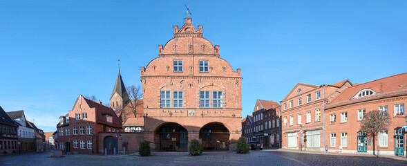 Panorama of the market place in the city of Gadebusch with the medieval town hall in red brick...