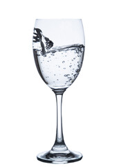 pouring water on a glass on white background clipping path