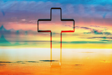 Silhouette of shining cross on sunset, sunrise background. Banner. Copy space. Easter, Ascension...
