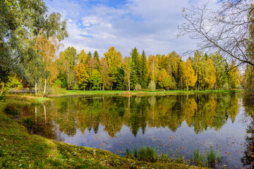 Fototapeta na wymiar Picturesque Park in autumn in Gatchina town, a suburb of Saint Petersburg, Russia