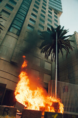 People loot and burn a office building during a protest in Chile