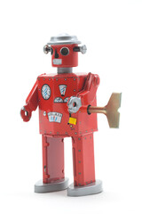 Fototapeta premium Old toy red metal robot on white
