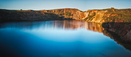 panoramic lake surrounded by a cliff