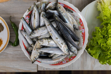 Raw fish. Culinary background with selective focus