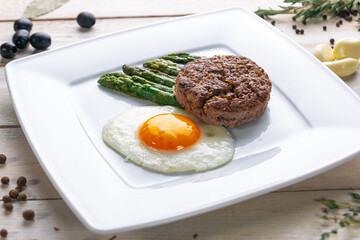 Beautiful juicy healthy food from the chef for an expensive restaurant delicious dishes for guests with a beautiful presentation, fish delicacies, delicious meat with asparagus food photo