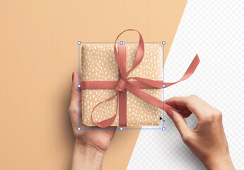 Mockup of Hands Holding Gift Box with Ribbon