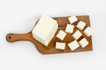 White feta cheese on white background