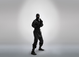 japanese ninja in black uniform, on grey background © tankist276