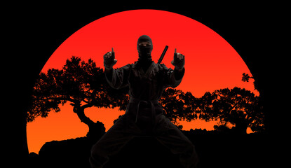 japanese ninja in black uniform, on red sunset background - 393161031