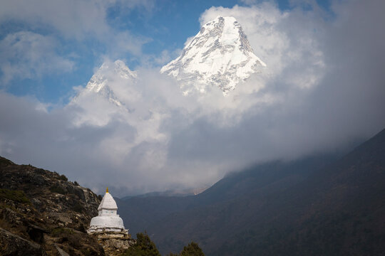 Buddhist stupa in front of Ama Dablam in Himalayas
