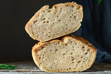 whole grain bread with pumpkin and sunflower seeds rye sourdough loaf gray dough organic portion on the table serving healthy meal snack ingredient top view copy spacefor text food background rustic