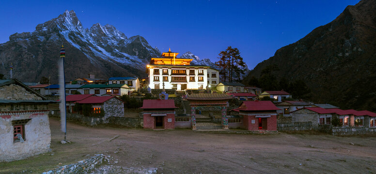 Exterior view of Tengboche Monastery with mountain in background at night