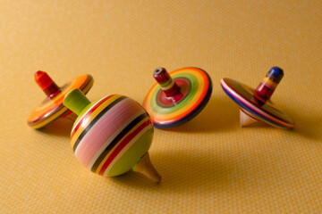 Mexican trompo and pirinolas, traditional Mexican toy with bright colors