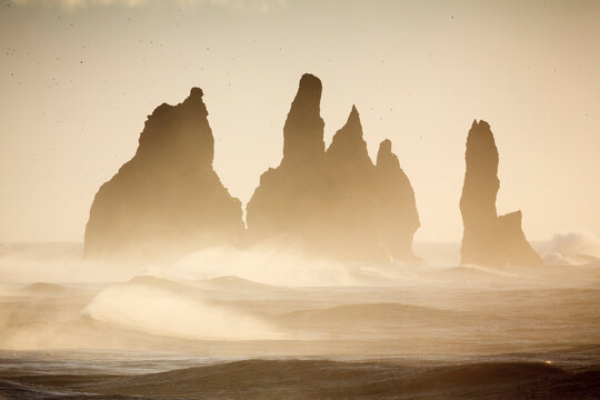 Scenic view of Reynisdrangar sea stacks during sunset