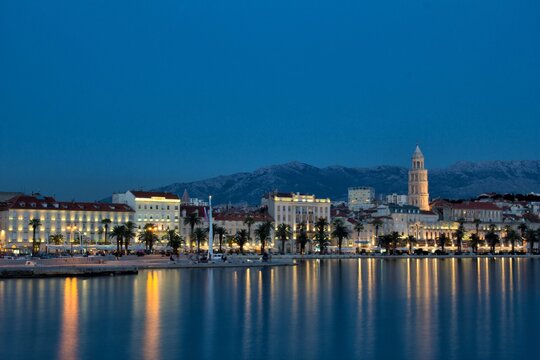 View of city against sky at dusk