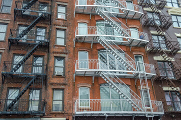 Typical Manhattan Apartments with Fire Escape Ladders in New York City, USA