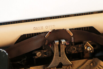 Game over - type-written text, vintage typewriter