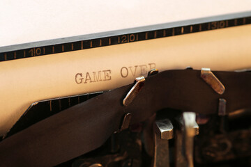 Game over - type-written text, vintage typewriter