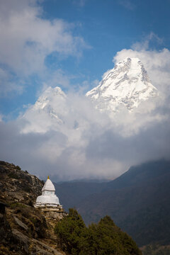 Buddhist stupa in front of Ama Dablam in Himalayas