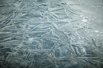 Close up of ice pattern on surface of frozen lake