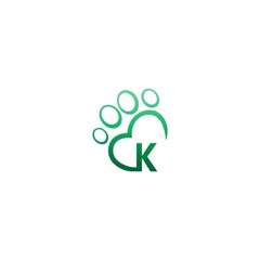 Letter K icon on paw prints logo