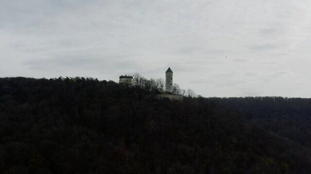 The fairytale castle burg Plesse in Bovenden near G&ouml;ttingen Goettingen at sunrise, Lower Saxony, Germany. Drone aerial shot of the Plesseburg in late autumn.