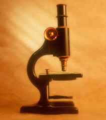 Antique microscope on textured paper background.