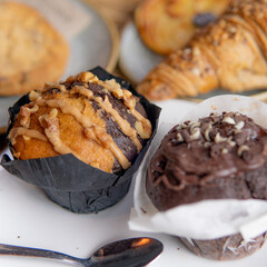 .breakfast of croissants, coffee with milk and pastries