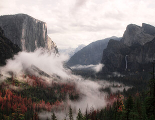 A storm breaks surrounding Tunnel View with clouds in California's Yosemite National Park 