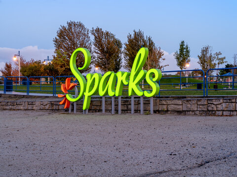 View of the Lighted Sparks logo sign on the beach of the Sparks Marina park at sunrise on September 29th, 2019.