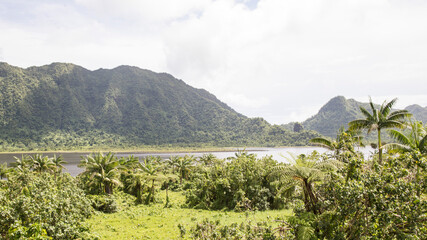 Crater full of water surrounded by a tropical exotic landscape, Samoa