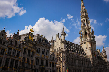 Fototapeta na wymiar Brussels, Belgium - May 11, 2018: View Of The Ancient Gothic Grand Place (Also Used Name Grand Square Or Grote Markt) Filled With Tourists On A Sunny Spring Day.