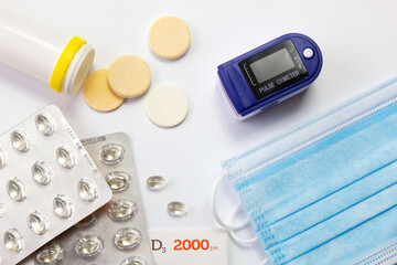 Vitamin c and d, pulse oximeter and disposable masks
