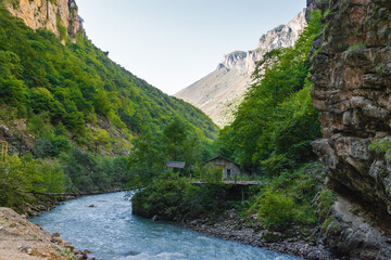 Sunny view of  mountains and Eltyulbyu village in North Caucasus, Kabardino-Balkaria, Russia.