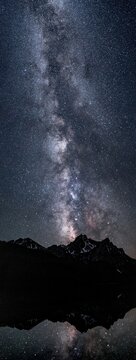 Milky way and stars over McGown Peak, Sawtooth mountains reflecting in Stanley Lake, ID. 