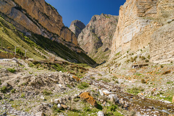 Sunny view of  mountains and Eltyulbyu village in North Caucasus, Kabardino-Balkaria, Russia.